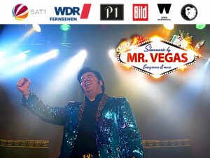 Buchbar bei Eddy-Events.de | Willkommen bei Eddy-Events - Ihrem professionellen Partner für Premium Retro & Oldies Entertainment. Wir bieten Ihnen hochwertige Live-Unterhaltung mit King Eddy und seinem Team von talentierten Musikern und Sängern. Ob Kongresse, Tagungen, Messen, Galas, Kick-Off-Events, Awards, Festivals, Pressebälle oder Produktpräsentationen - wir sorgen dafür, dass Ihre Veranstaltung unvergesslich wird. Buchen Sie jetzt eine Liveband, Musik für Ihre Hochzeit oder einen Sänger für Ihren Geburtstag. Mit 40 Jahren Bühnenerfahrung und zahlreichen Auftritten, auch in bekannten TV-Formaten wie SAT.1, sind wir Ihr Highlight für jeden besonderen Anlass. Wir bieten eine große Auswahl an Künstlern und Musikern, um sicherzustellen, dass wir Ihre individuellen Bedürfnisse erfüllen können. Unsere professionellen Musiker und Sänger sind darauf spezialisiert, die besten Hits der 50er, 60er und 70er Jahre zum Leben zu erwecken und Ihre Gäste auf die Tanzfläche zu bringen. Wir haben alles, was Sie brauchen, um Ihre Feier zu einem unvergesslichen Erlebnis zu machen. Kontaktieren Sie uns noch heute für eine unverbindliche Anfrage und ein Angebot, das perfekt auf Ihre Bedürfnisse zugeschnitten ist. Bei Eddy-Events geht es nicht nur um großartige Musik und Unterhaltung - es geht auch darum, unseren Kunden eine herausragende Erfahrung zu bieten. Deshalb sind wir stets bemüht, Ihnen den bestmöglichen Service zu bieten und dafür zu sorgen, dass Ihre Veranstaltung ein voller Erfolg wird. Wir freuen uns darauf, Ihnen bei der Planung Ihrer nächsten Feier behilflich zu sein.